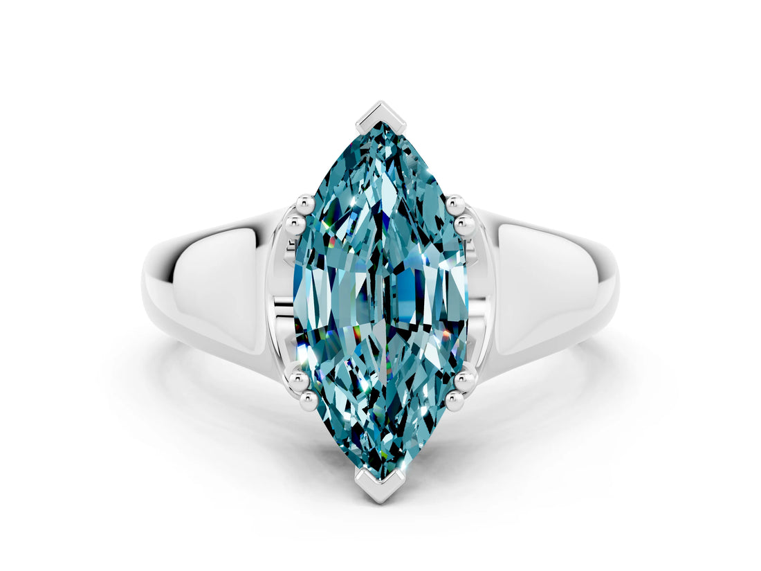 White gold Marquise Cut Blue Topaz Solitaire Ring with Wide Band and Prong Setting