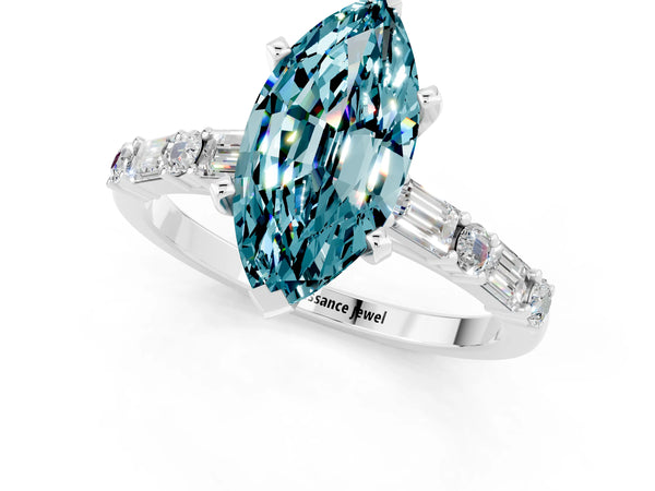 Silver Marquise Cut Blue Topaz Solitaire with Side Baguettes and Channel Set Band