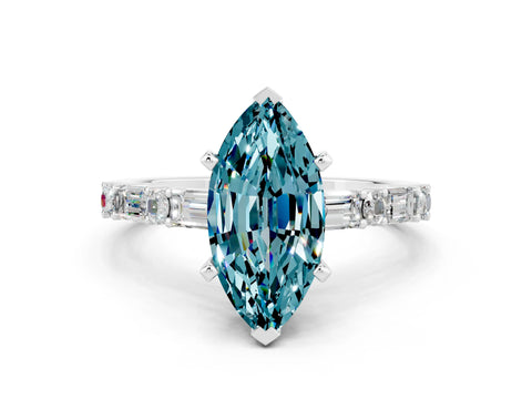White gold Marquise Cut Blue Topaz Solitaire with Side Baguettes and Channel Set Band