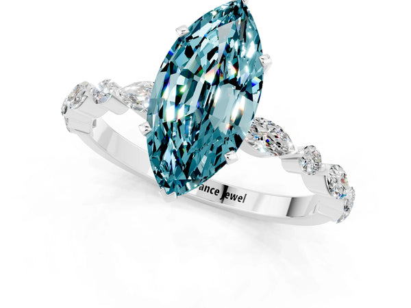 Platinum Marquise Cut Blue Topaz Ring with Marquise and Round  Side Stones and Four-Prong Setting