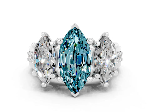 White gold Marquise Cut Blue Topaz Three-Stone Ring with Channel Set Band and Four-Prong Setting