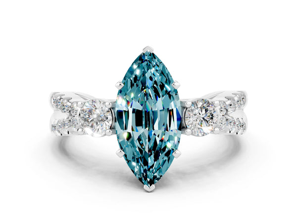 Silver Marquise Cut Blue Topaz Three-Stone Ring with Pavé Split Shank and Four-Prong Setting