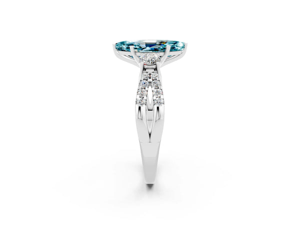 White gold Marquise Cut Blue Topaz Three-Stone Ring with Pavé Split Shank and Four-Prong Setting
