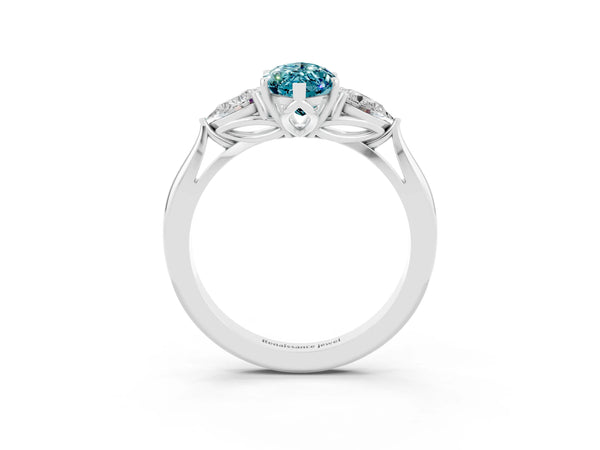 Platinum Marquise Cut Blue Topaz Three-Stone Ring with Pear  Side Stones and Prong Setting