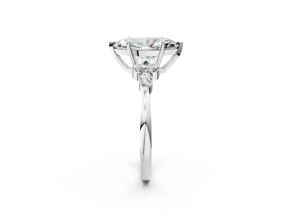 White gold Marquise Cut Brilliant Diamond Solitaire Ring with Pear Side Stones and Four-Prong Setting