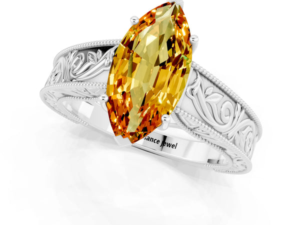 Silver Marquise Cut Citrine Solitaire Ring with Engraved Band and Four-Prong Setting