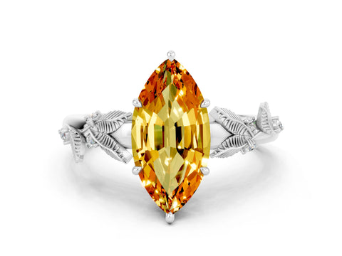 White gold Marquise Cut Citrine Solitaire Ring with Leaf Motif Band and Four-Prong Setting