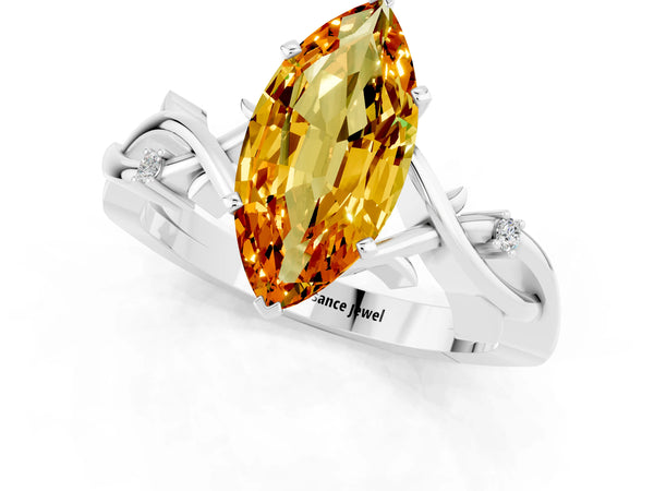 White gold Marquise Cut Citrine Solitaire Ring with Twisted Band and Prong Setting