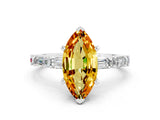 White gold Marquise Cut Citrine Solitaire with Side Baguettes and Channel Set Band