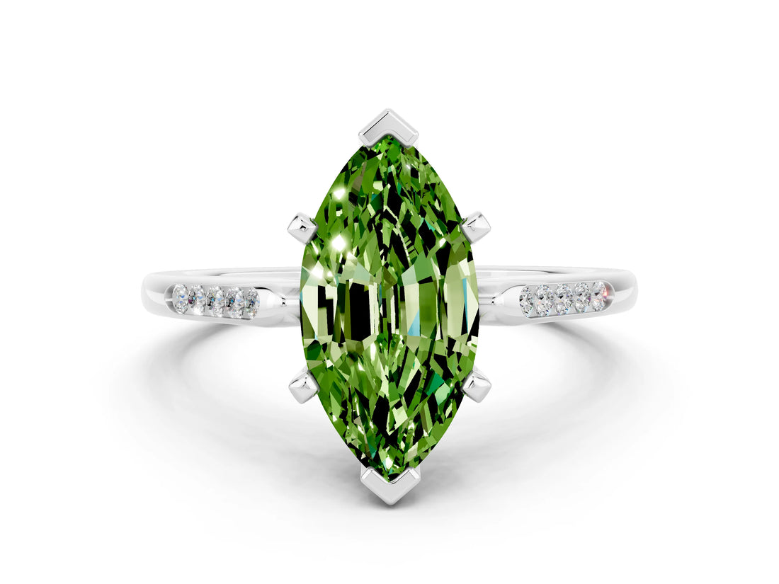White gold Marquise Cut Cut Channel Set Solitaire Engagement Ring with Four-Prong Setting