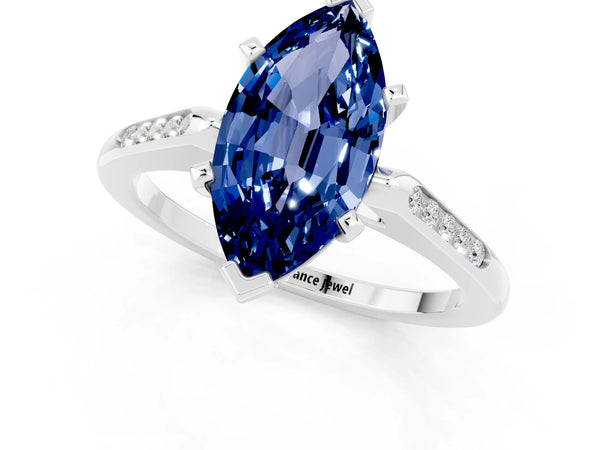 Silver Marquise Cut Blue Sapphire Solitaire Ring with Channel Set Round Band and Prong Setting