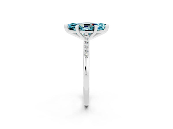 White gold Marquise Cut Blue Topaz Solitaire Ring with Channel Set Round Band and Prong Setting