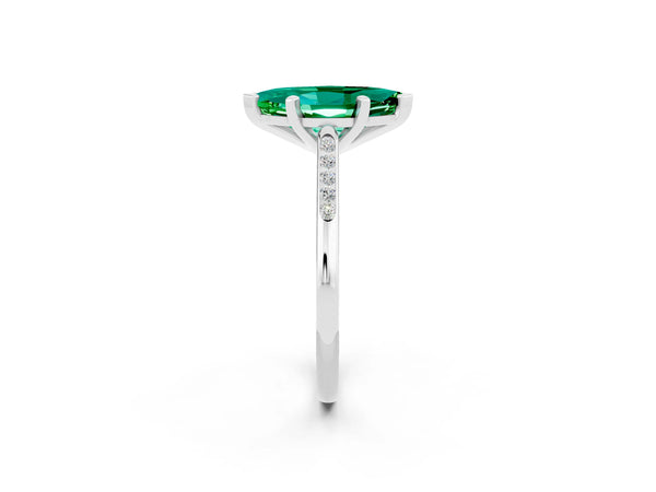 Platinum Marquise Cut Emerald Solitaire Ring with Channel Set Round Band and Prong Setting