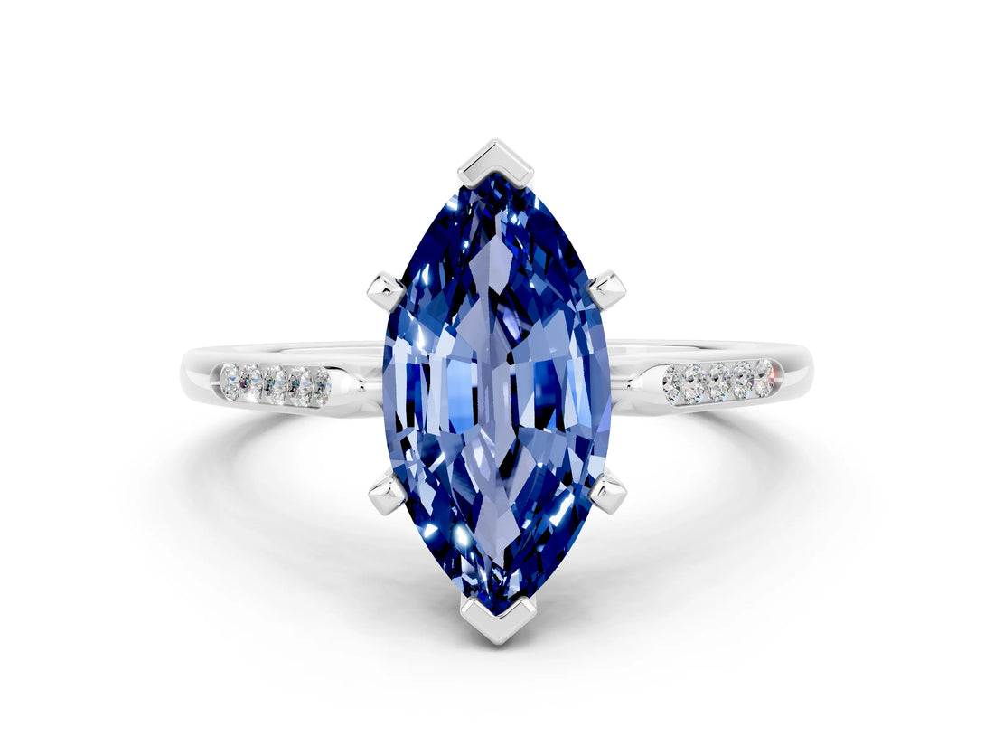 White gold Marquise Cut Cut Channel Set Solitaire Engagement Ring with Four-Prong Setting