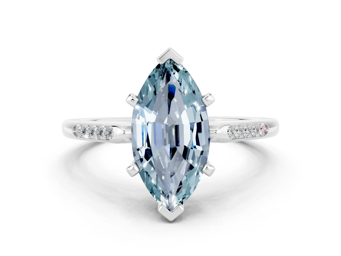 White gold Marquise Cut Cut Channel Set Solitaire Engagement Ring with Four-Prong Setting