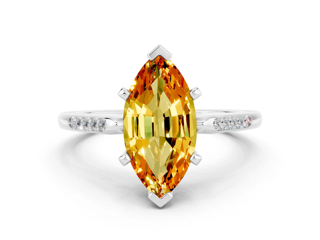 White gold Marquise Cut Cut Channel Set Solitaire Engagement Ring with Four-Prong Setting