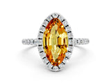 White gold Marquise Cut Cut Diamond Floral Halo Engagement Ring with Pavé Band and Prong Setting