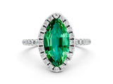 White gold Marquise Cut Cut Diamond Floral Halo Engagement Ring with Pavé Band and Prong Setting
