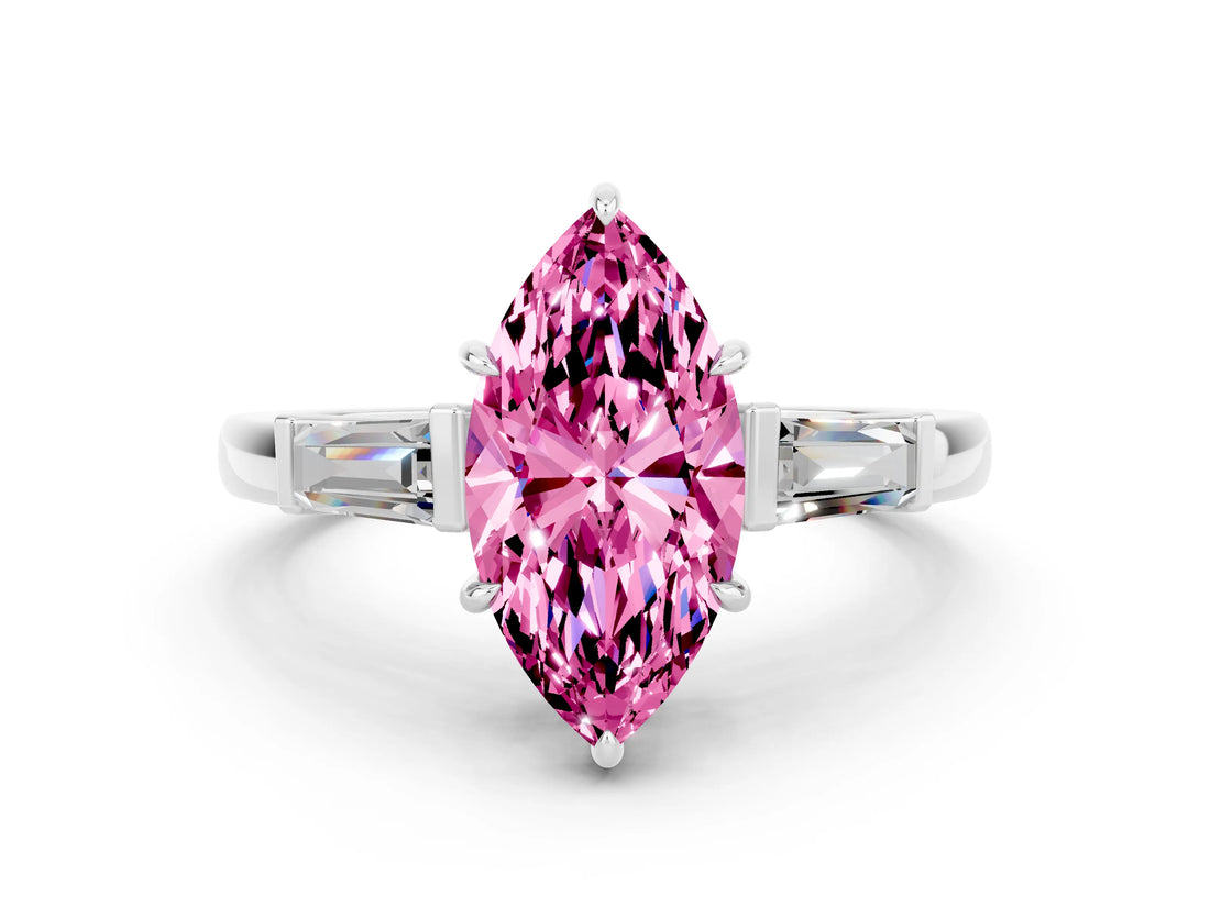 White gold Marquise Cut Cut Diamond Ring with Tapered Baguette Side Stones in Four-Prong Setting