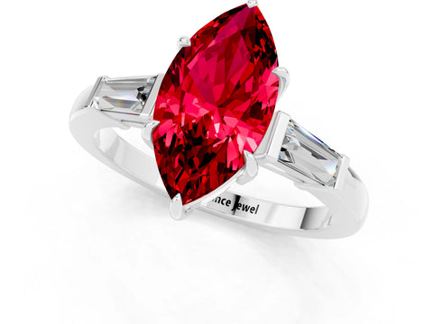 White gold Marquise Cut Cut Diamond Ring with Tapered Baguette Side Stones in Four-Prong Setting_1