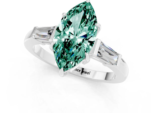 Silver Marquise Cut Green Sapphire Three-Stone Ring with Tapered Baguette Side Stones and Prong Setting