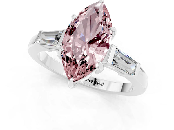 White gold Marquise Cut Cut Diamond Ring with Tapered Baguette Side Stones in Four-Prong Setting