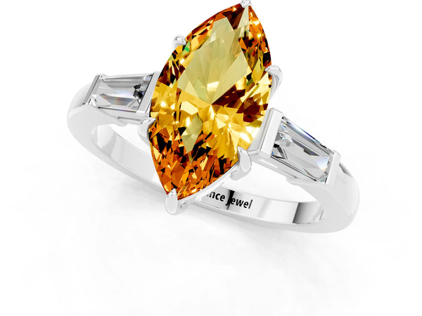 Platinum Marquise Cut Citrine Three-Stone Ring with Tapered Baguette Side Stones and Prong Setting