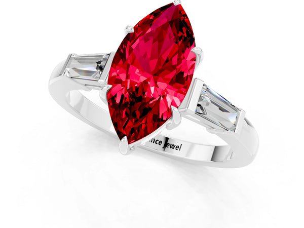 White gold Marquise Cut Cut Diamond Ring with Tapered Baguette Side Stones in Four-Prong Setting