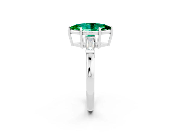 Platinum Marquise Cut Emerald Three-Stone Ring with Tapered Baguette Side Stones and Prong Setting