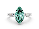 White gold Marquise Cut Cut Diamond Ring with Tapered Baguette Side Stones in Four-Prong Setting