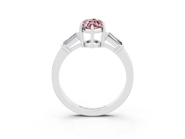 White gold Marquise Cut Cut Diamond Ring with Tapered Baguette Side Stones in Four-Prong Setting