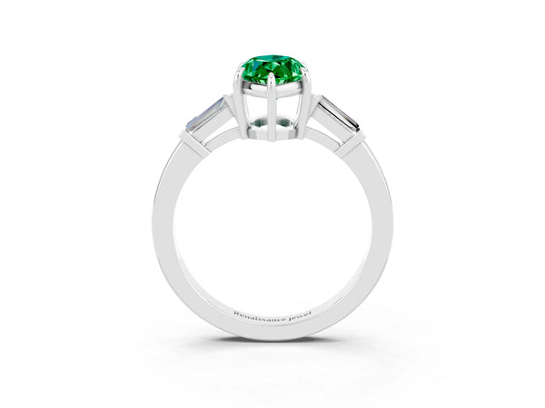 Platinum Marquise Cut Emerald Three-Stone Ring with Tapered Baguette Side Stones and Prong Setting