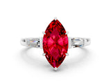 White gold Marquise Cut Cut Diamond Ring with Tapered Baguette Side Stones in Four-Prong Setting