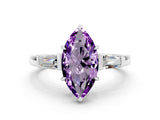 White gold Marquise Cut Cut Diamond Ring with Tapered Baguette Side Stones in Four-Prong Setting