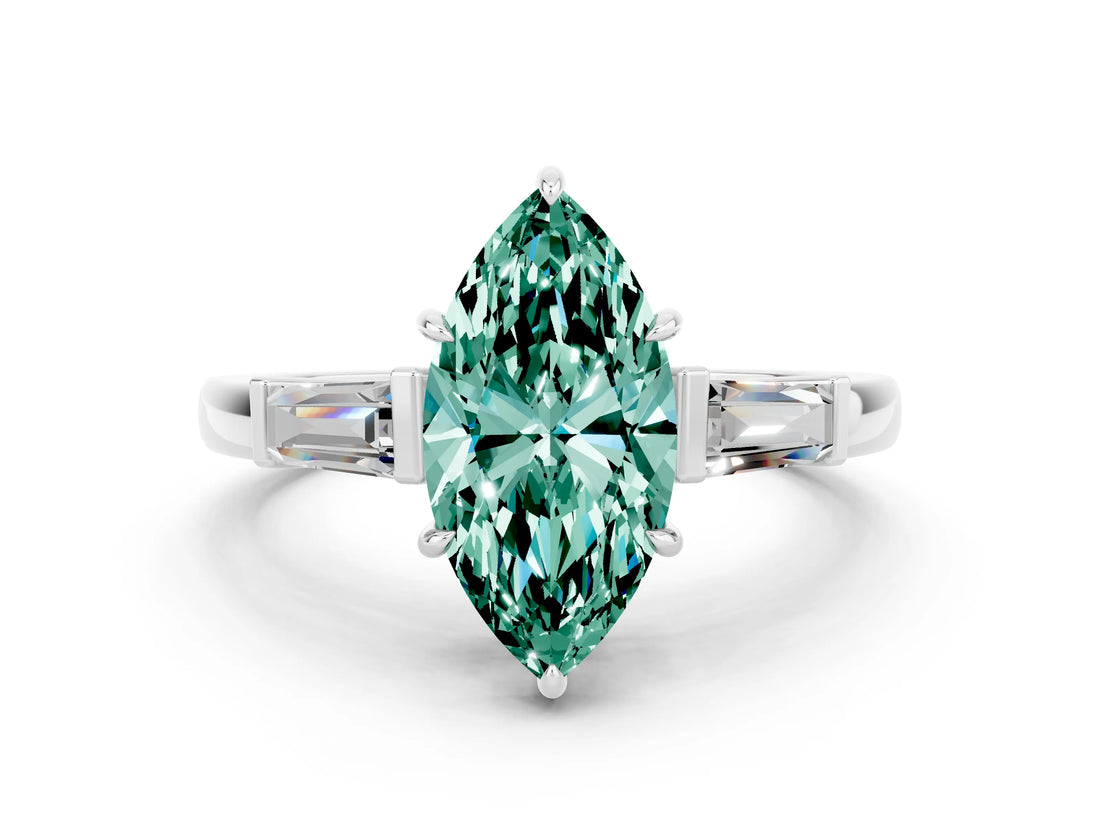 White gold Marquise Cut Cut Diamond Ring with Tapered Baguette Side Stones in Four-Prong Setting