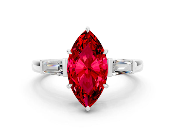 Platinum Marquise Cut Cut Diamond Ring with Tapered Baguette Side Stones in Four-Prong Setting