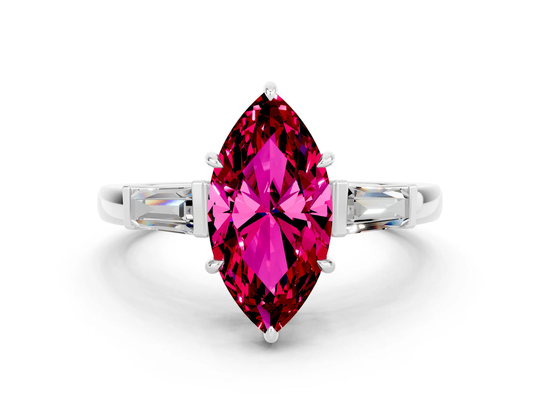 White gold Marquise Cut Cut Diamond Ring with Tapered Baguette Side Stones in Four-Prong Setting