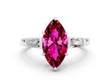 White gold Marquise Cut Cut Diamond Ring with Tapered Baguette Side Stones in Four-Prong Setting