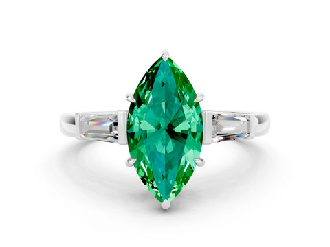 White gold Marquise Cut Cut Diamond Ring with Tapered Baguette Side Stones in Four-Prong Setting