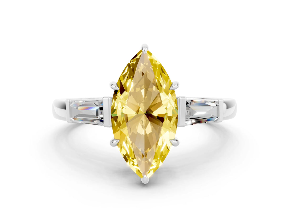 White gold Marquise Cut Cut Diamond Ring with Tapered Baguette Side Stones in Four-Prong Setting