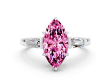 White gold Marquise Cut Cut Diamond Ring with Tapered Baguette Side Stones in Four-Prong Setting