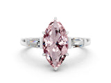 White gold Marquise Cut Cut Diamond Ring with Tapered Baguette Side Stones in Four-Prong Setting