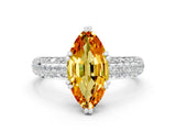 White gold Marquise Cut Cut Pave Diamond Engagement Ring with Channel Set Band and Four-Prong Setting