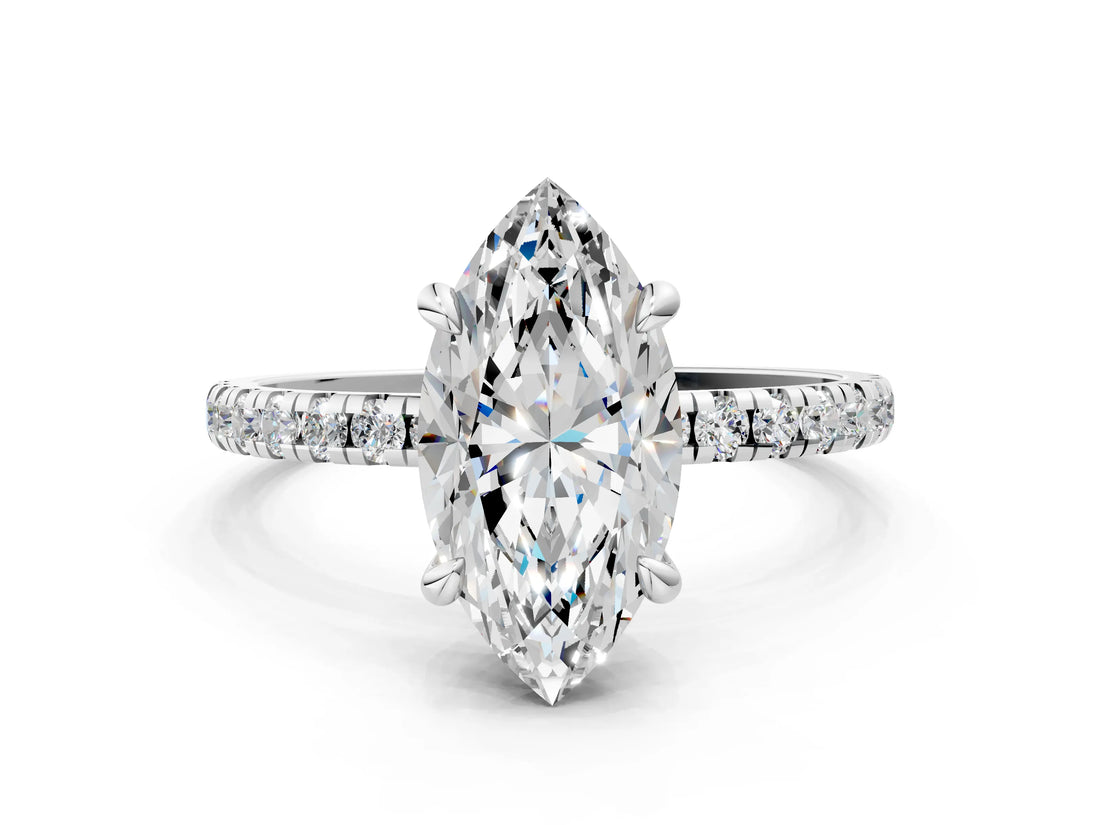 White gold Marquise Cut Diamond Brilliant Solitaire Ring with Pavé Band and Four-Prong Setting