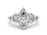White gold Marquise Cut Diamond Cluster Ring with Round Accent Stones and Prong Setting on a Classic Band_135