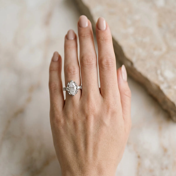 White gold Marquise Cut Diamond Floral Halo Engagement Ring with Shared Prong Setting