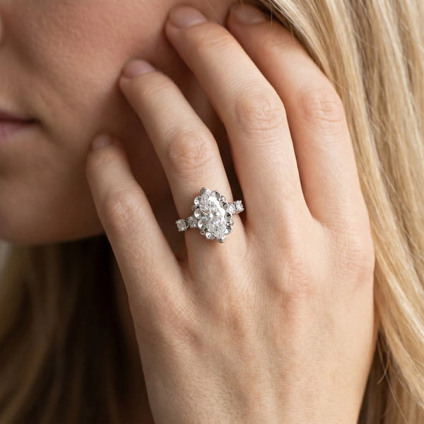 White gold Marquise Cut Diamond Floral Halo Engagement Ring with Shared Prong Setting