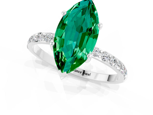 Silver Marquise Cut Emerald Solitaire Ring with Round Pavé Shoulders and Prong Setting