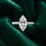 14K White Gold 0.61 Carat D VVS1 Marquise Diamond Pave Band Solitaire Ring with Round and Prong Setting
