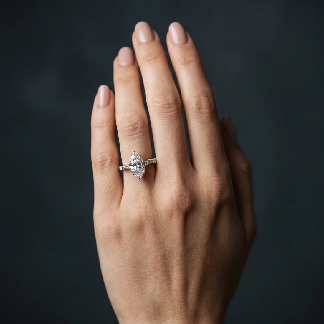 White gold Marquise Cut Diamond Ring with Baguette Side Stones, Channel Set Band, and Four-Prong Setting_57